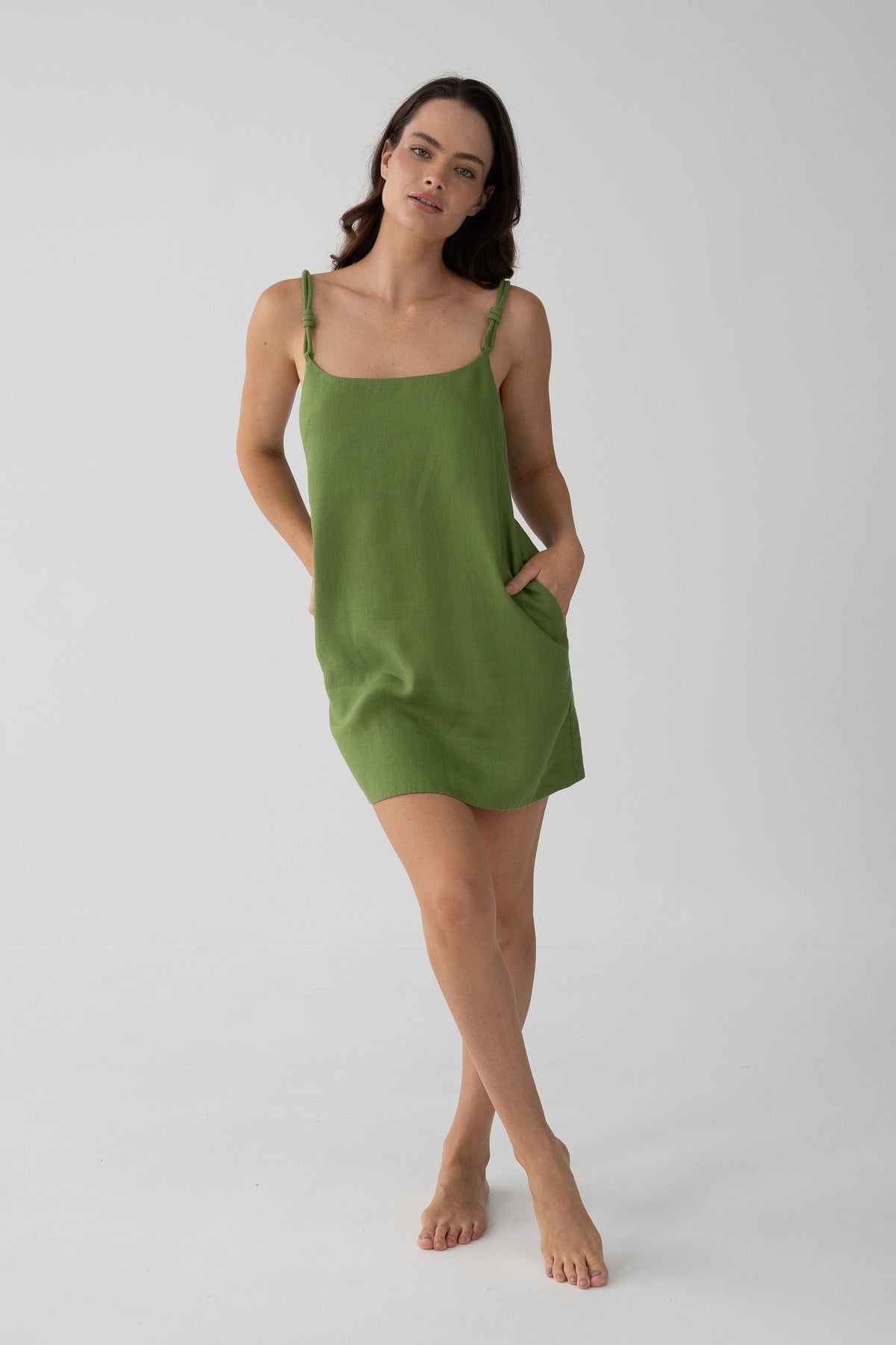 Tevi Linen Short Slip Dress in Lime Green - hands in pockets, relaxed A-line silhouette - Lilly Pilly Collection