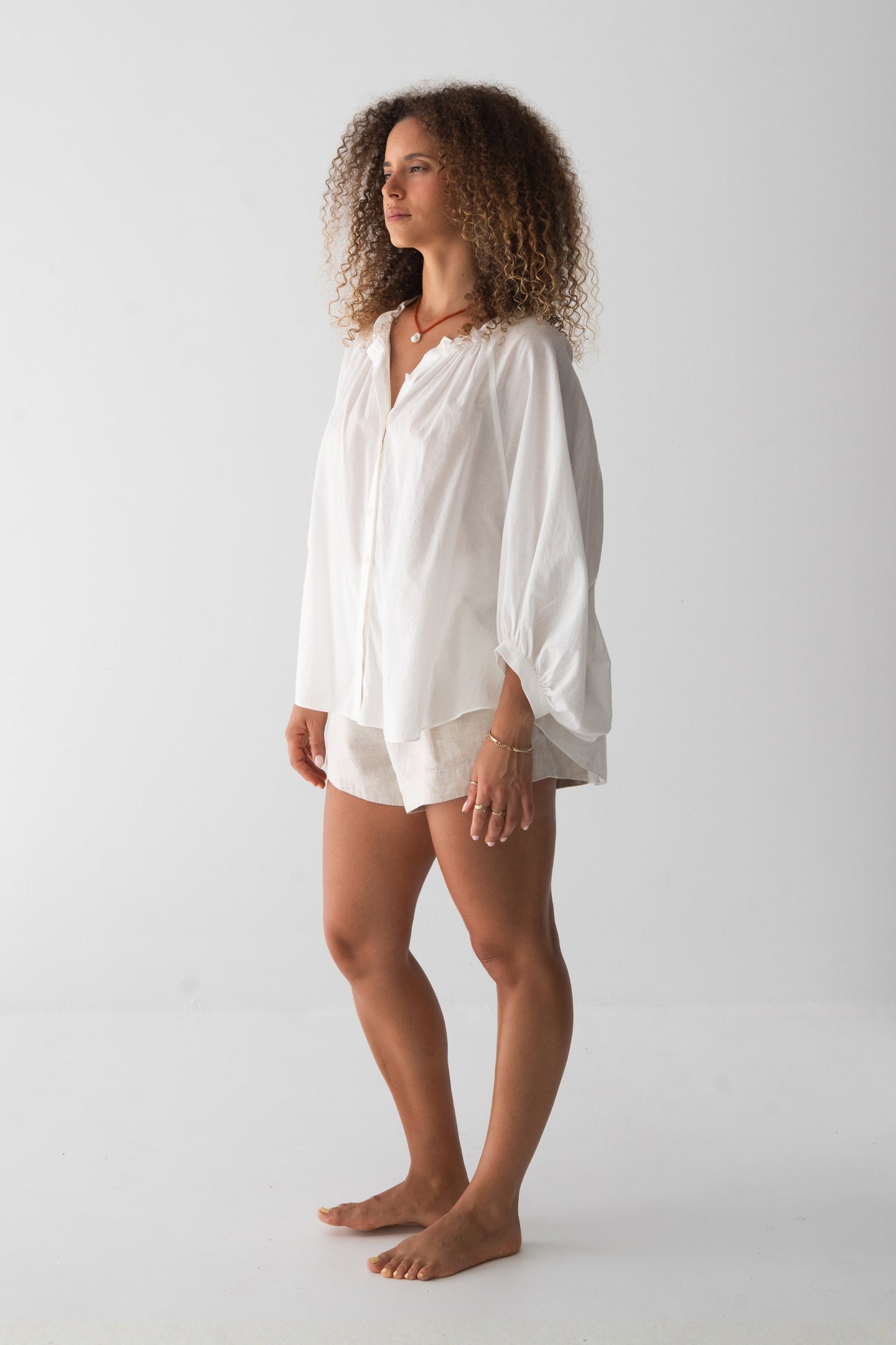 Thalia Cotton Voile Shirt in Ivory - side view, balloon sleeves - Lilly Pilly Collection