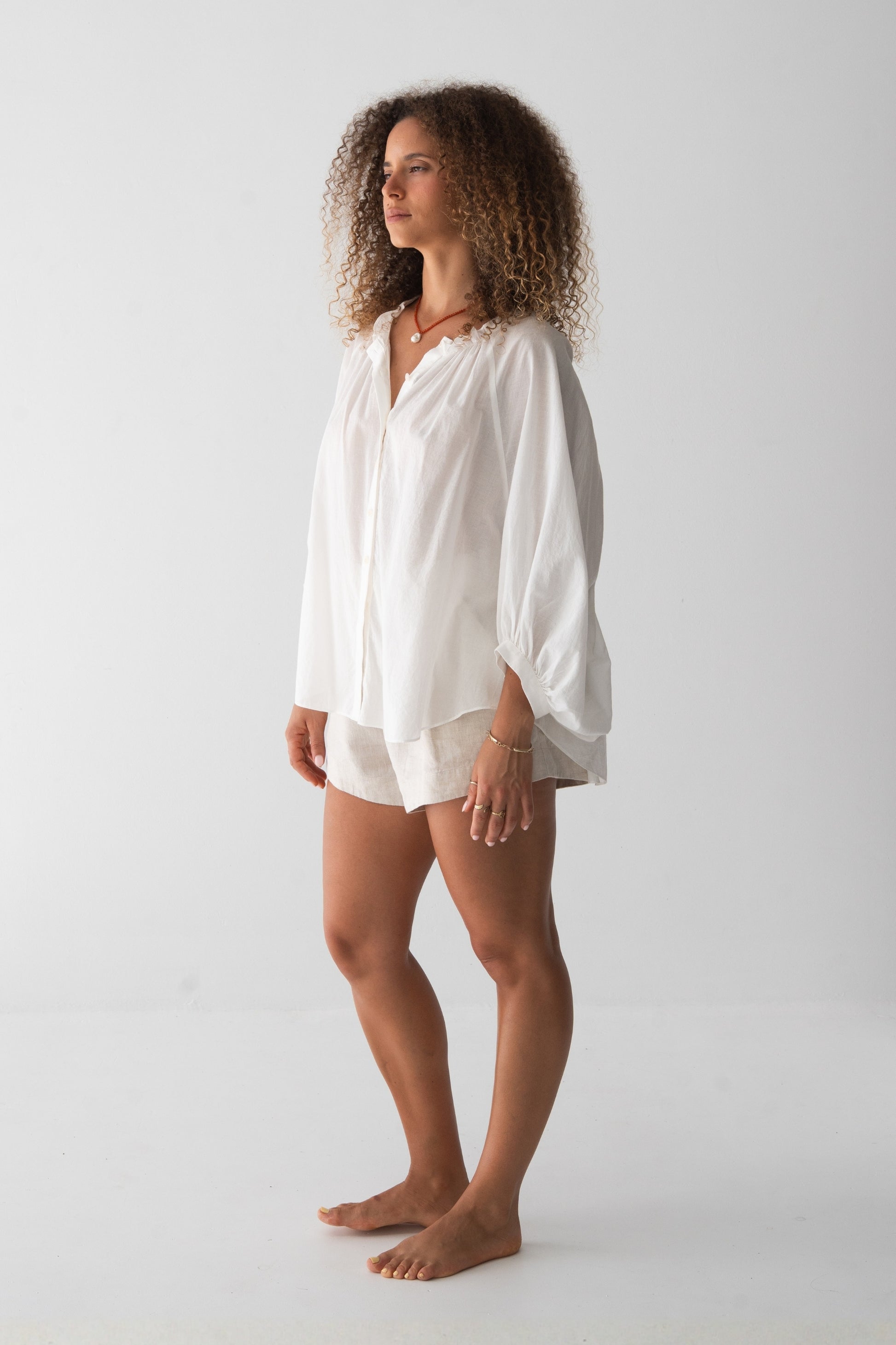 Thalia Cotton Voile Shirt in Ivory - side view, balloon sleeves - Lilly Pilly Collection