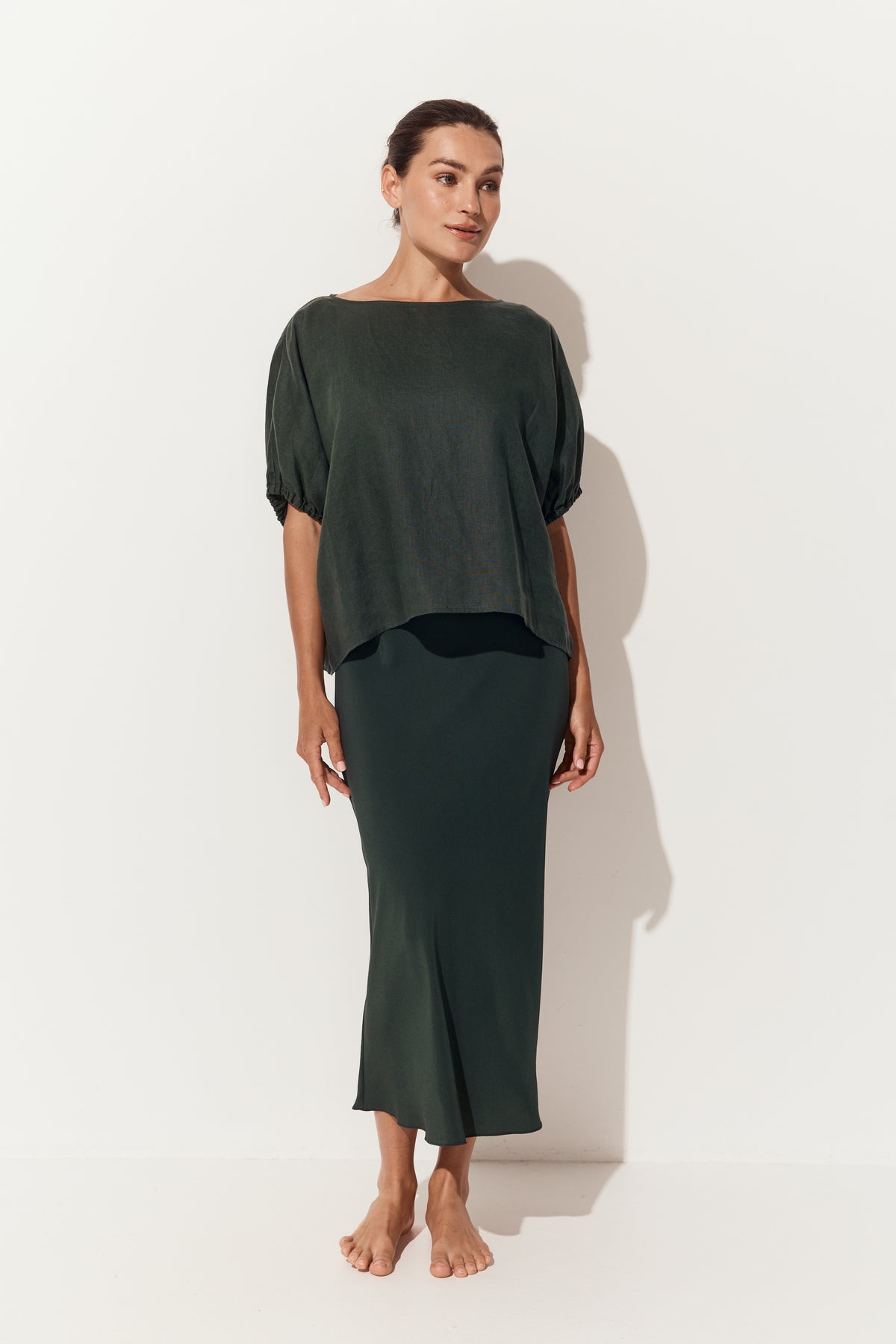 Tina Linen Top in Forest Green - three quarter view with matching Freya silk slip - Lilly Pilly Collection