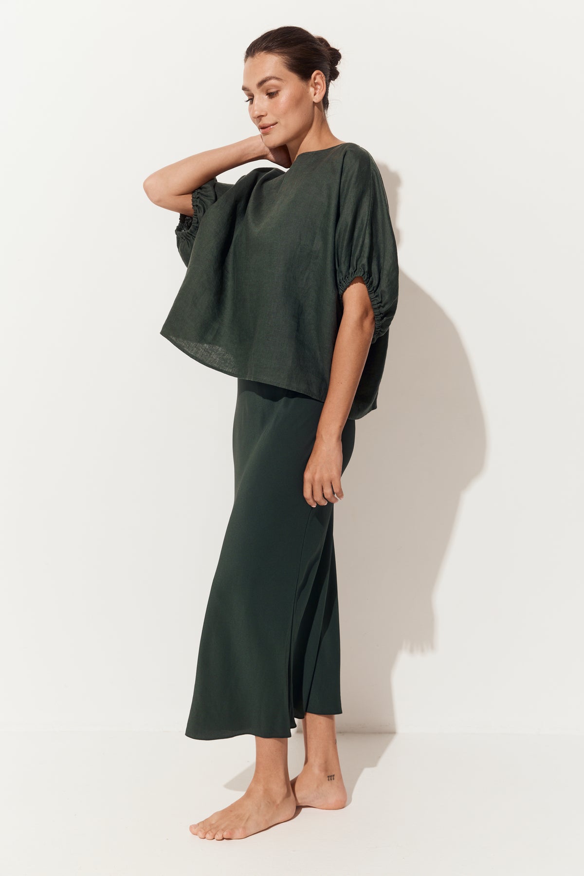 Tina Linen Top in Forest Green - side view with matching Freya silk slip - Lilly Pilly Collection