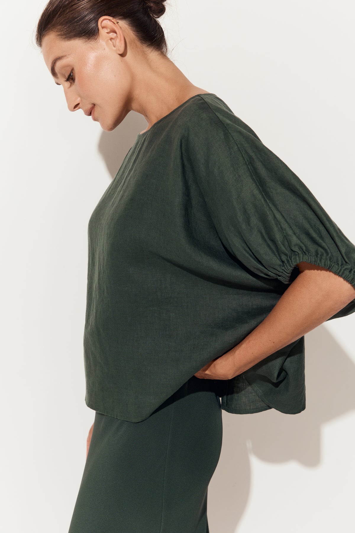 Tina Linen Top in Forest Green - close up side view with matching Freya silk slip - Lilly Pilly Collection