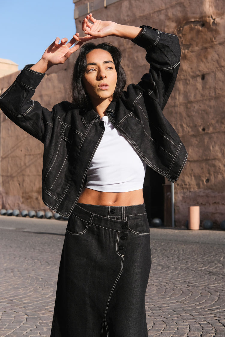 Wes Linen Jacket in Black - front view, posing outdoors on a street - Lilly Pilly Collection