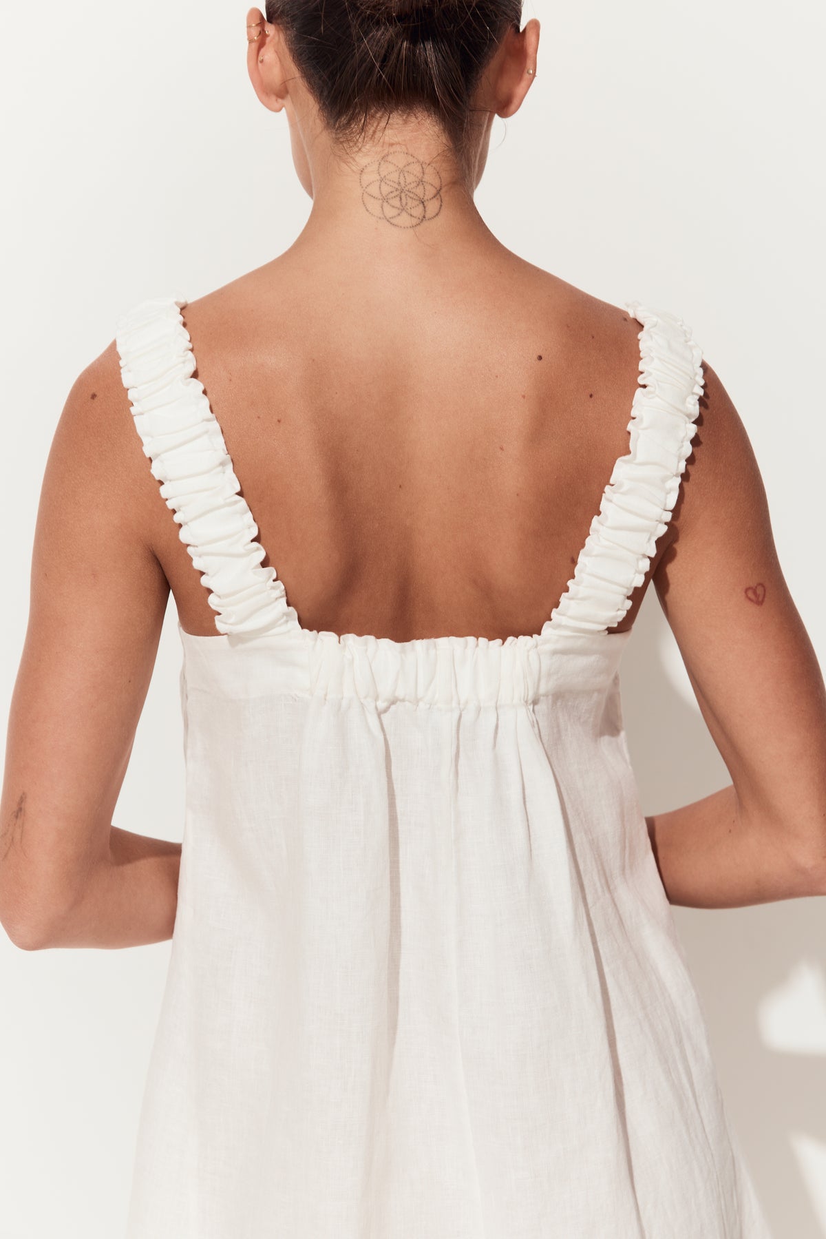 Zahra Linen Mini Dress in Ivory - close up back view of shoulder strap details - Lilly Pilly Collection