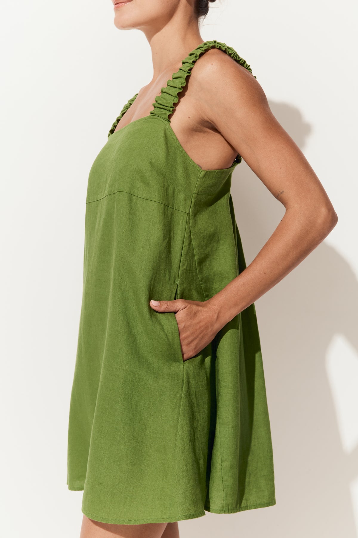 Zahra Linen Mini Dress in Lime Green - side view with shoulder straps - Lilly Pilly Collection