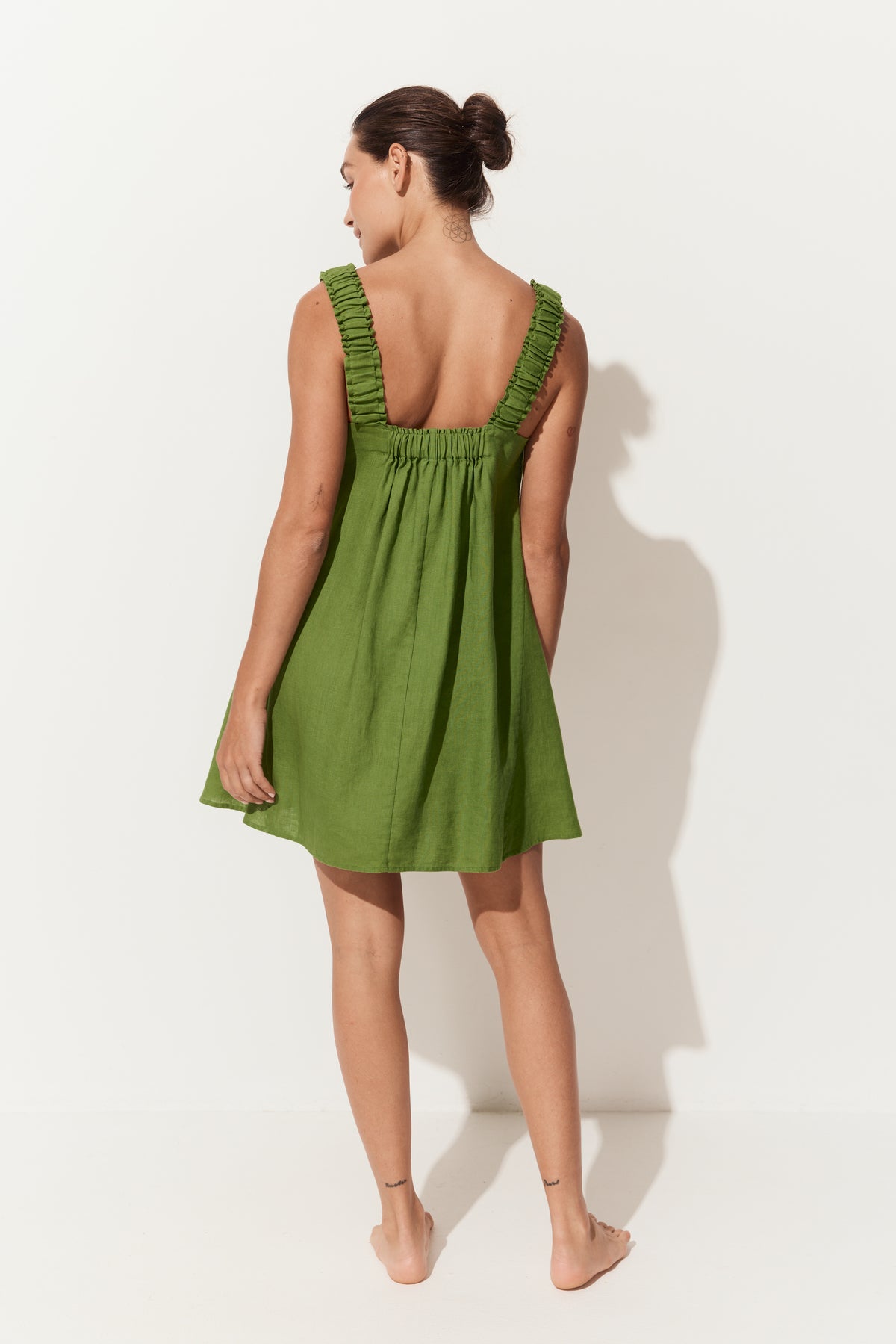Zahra Linen Mini Dress in Lime Green - back view with open back and shoulder straps - Lilly Pilly Collection